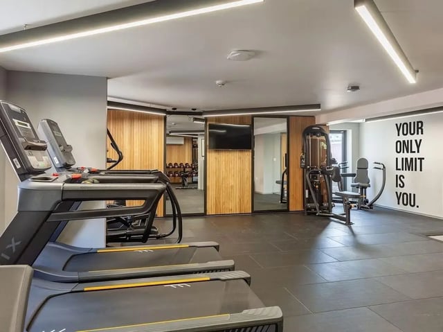 Treadmills and weight machines gym area at Devonshire Courtyard in Sheffield Student Accommodation