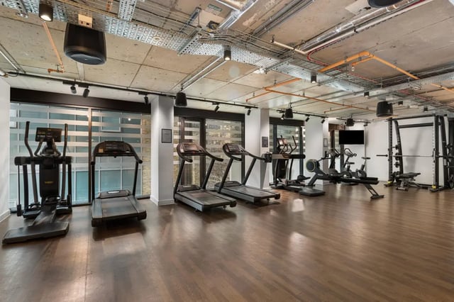 Treadmills elliptical rowers gym equipment fitness area at Chapter Aldgate in London Student Accommodation