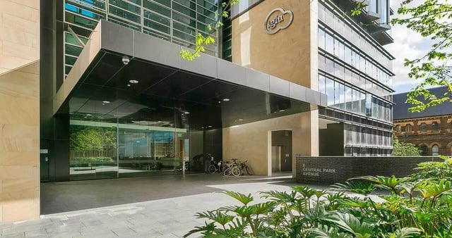 Bicycles parked near building entrance exterior at Iglu Central Park in Sydney Student Accommodation