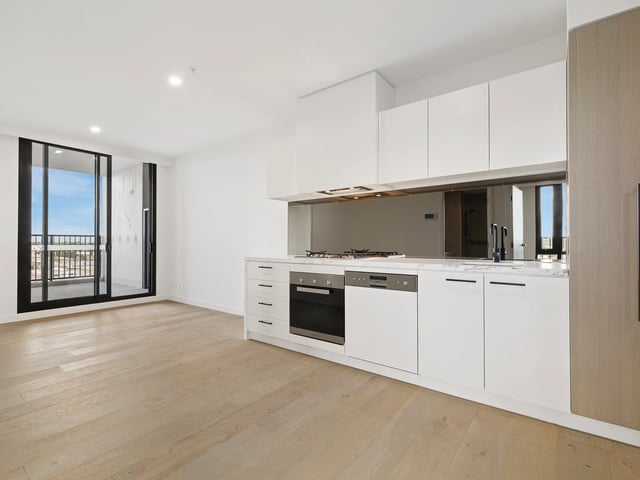 Modern kitchen with oven dishwasher sink and balcony kitchen at BELONG Clayton Melbourne in Melbourne Student Accommodation