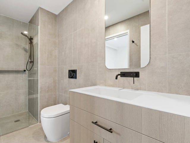 Toilet shower vanity mirror bathroom at BELONG Clayton Melbourne in Melbourne Student Accommodation