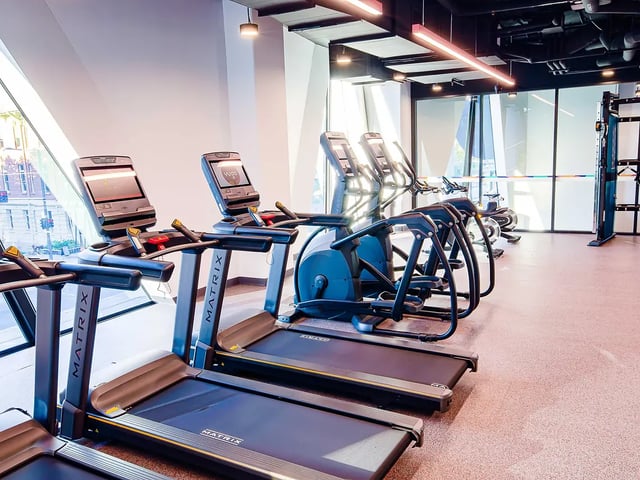 Treadmills and elliptical machines gym area at Yugo Adelaide City in Adelaide Student Accommodation