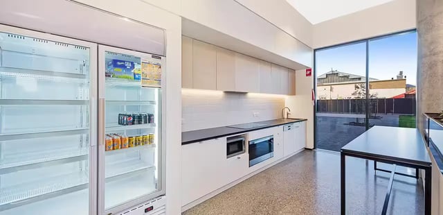 Large refrigerator cans and microwave kitchen at Scape Waymouth in Adelaide Student Accommodation