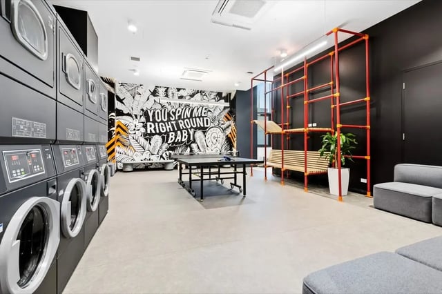 Washing machines ping pong table lounge area Communal Space at The Switch Adelaide in Adelaide Student Accommodation