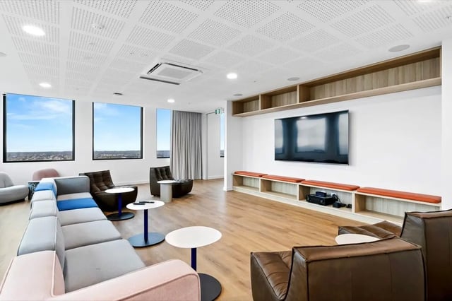 Sofa tables television and seating lounge area at The Switch Adelaide in Adelaide Student Accommodation