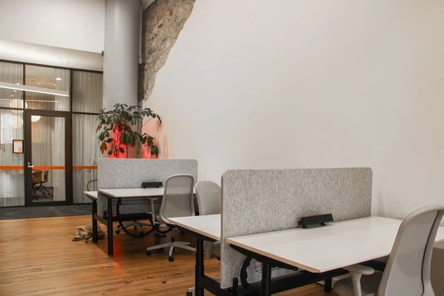 Desks chairs and plants study area at The Switch Adelaide in Adelaide Student Accommodation