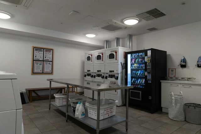 Washers dryers vending machine ironing boards laundry room at dwell East End Adelaide in Adelaide Student Accommodation