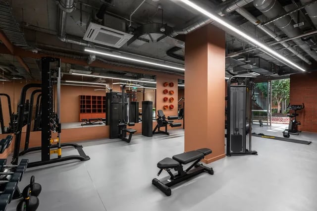 Gym equipment weights bench and exercise machines gym at Campus House in Melbourne Student Accommodation