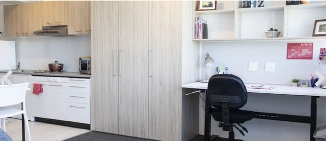 Wardrobe kitchen and study desk area room at UniLodge @ Metro Adelaide in Adelaide Student Accommodation