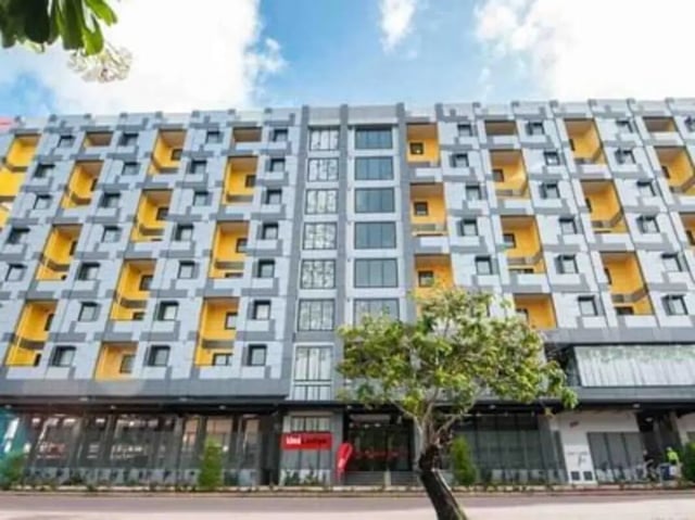Modern student accommodation building yellow balconies exterior at UniLodge Darwin in Darwin Student Accommodation