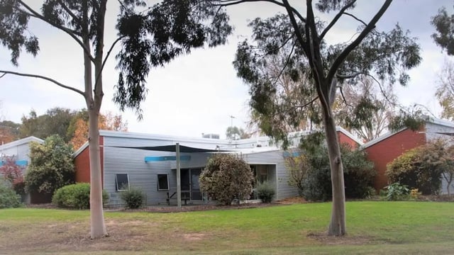 Corrugated buildings with trees and grass exterior at UniLodge Wodonga East End in Wodonga Student Accommodation