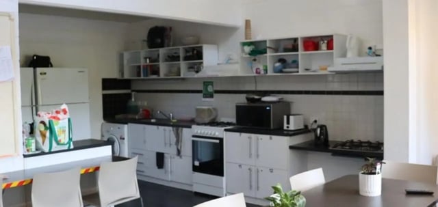 Kitchen with fridge oven microwave washing machine kitchen at La Trobe University - Units in Melbourne Student Accommodation