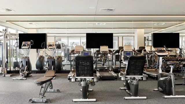 Gym equipment with treadmills and weight machines Gym at Realm Caulfield in Melbourne Student Accommodation