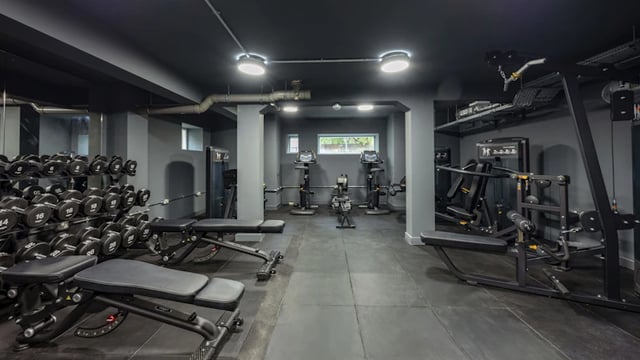 Dumbbells machines benches and treadmills gym at St Gabriels in Manchester Student Accommodation
