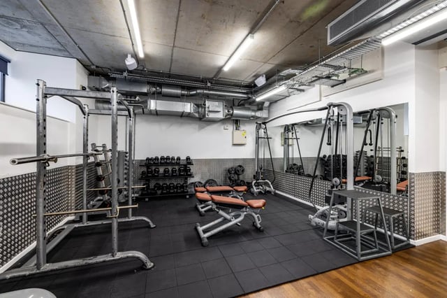 Gym equipment weights benches and mirrors gym at Chapter Portobello in London Student Accommodation