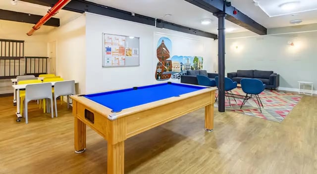Pool table seating area and tables common room at Nottingham Square in Nottingham Student Accommodation