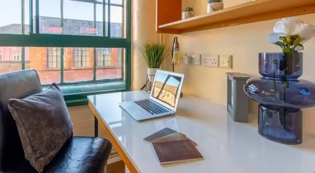 Laptop pillow on desk chair with window view Study area at Nottingham Square in Nottingham Student Accommodation