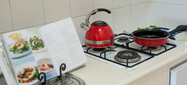 Red kettle cooking pan cookbook kitchen at Student Living-590 Lygon in Melbourne Student Accommodation