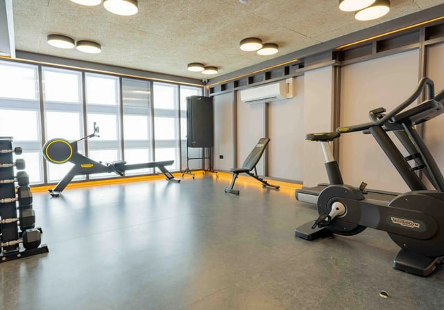 Gym equipment including treadmill rower and weights Gym at iQ Paris Gardens in London Student Accommodation