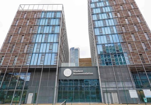 Modern glass buildings with wooden louvers exterior at iQ Paris Gardens in London Student Accommodation