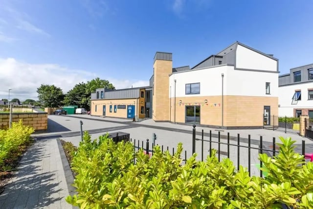 Modern buildings with beige and white facades exterior at Chapel Heights in Durham Student Accommodation