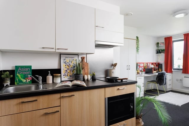 Kitchen with sink laptop and study desk kitchen at Elvet Studios in Durham Student Accommodation