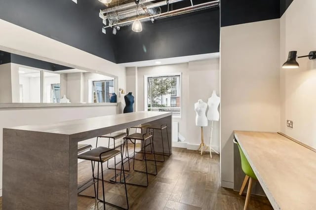 Bar with stools and a study desk study area at Chapter Islington in London Student Accommodation