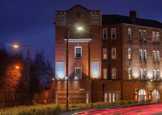 Ashton House building lit up at night exterior at Ashton House in Manchester Student Accommodation