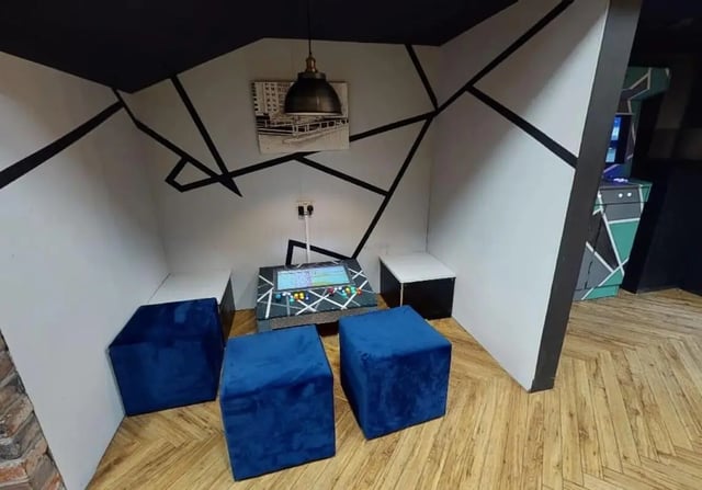Arcade game table blue stools playing area at iQ Wilmslow Park in Manchester Student Accommodation