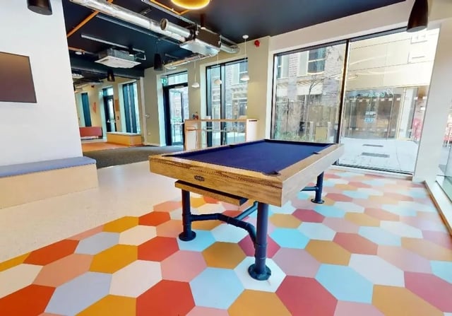 Pool table blue felt on hexagon floor communal area at iQ Signal Place in Nottingham Student Accommodation