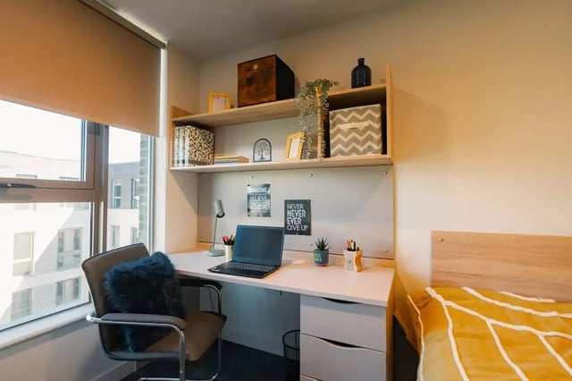 Desk with laptop chair shelves bed Bedroom at Redgate in Nottingham Student Accommodation