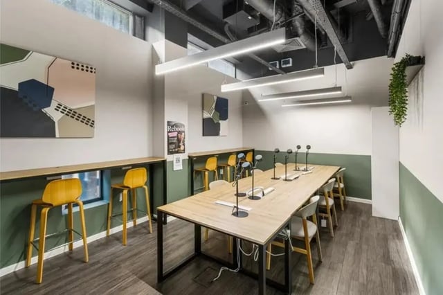 Long table with chairs and bar stools study area at Chapter Highbury in London Student Accommodation