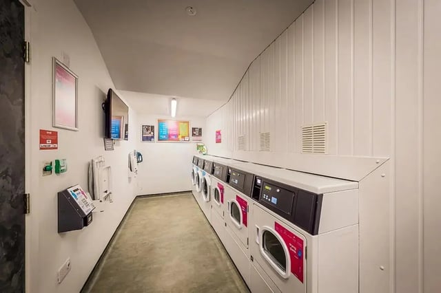 Washing machines and dryers laundry room at Chapter Westminster in London Student Accommodation
