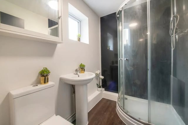 Toilet sink and glass shower enclosure bathroom at 4 Rob Roy House in Nottingham Student Accommodation