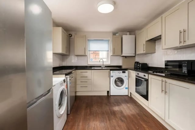 Stainless steel fridge washing machines cabinets oven kitchen at 28 Church Street in Nottingham Student Accommodation