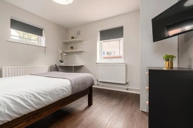 Bed, desk, shelves, TV, dresser bedroom at 28 Church Street in Nottingham Student Accommodation