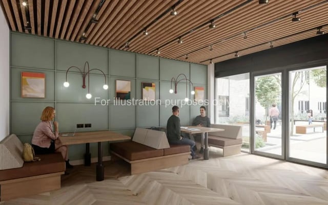 Seating areas with tables and art living room at Wilson House in Oxford Student Accommodation