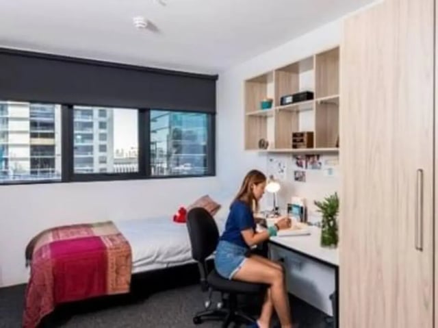 Student desk bed closet shelves study bedroom at Unilodge South Bank in Brisbane Student Accommodation