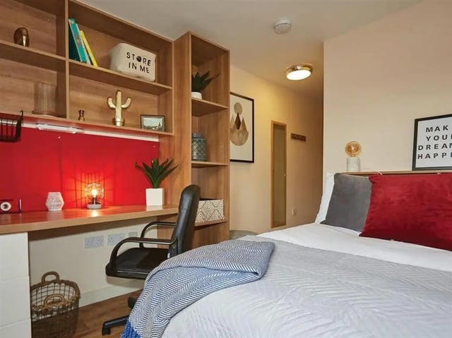 Desk bed shelves and chair student room at Abbeygate in Chester Student Accommodation