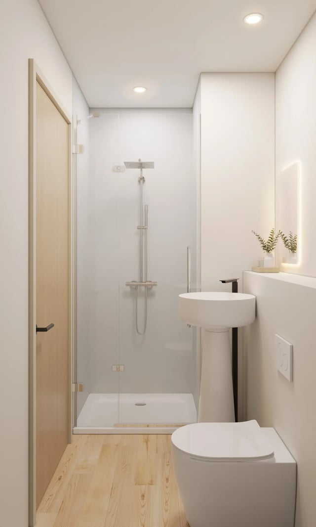Modern white bathroom with shower sink and toilet at Telephone House in Dundee Student Accommodation