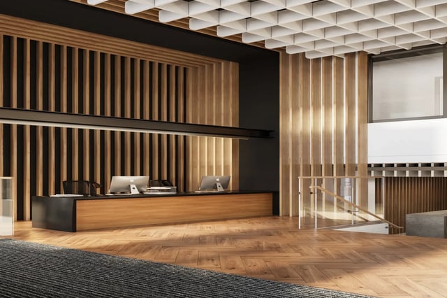 Reception desk with computers and stairs Image at Telephone House in Dundee Student Accommodation