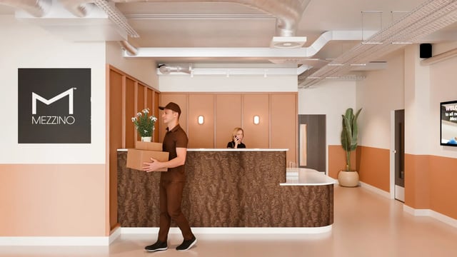 Delivery person with boxes at reception reception area at Valerian in York Student Accommodation