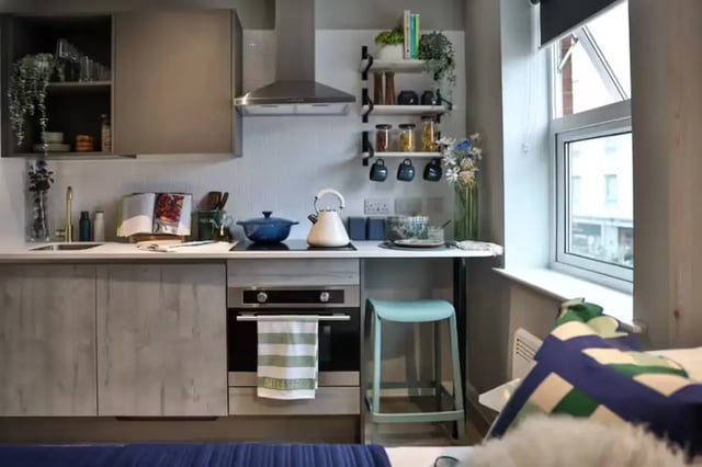 Modern kitchen with oven and stool kitchen at Brook Studios in Birmingham Student Accommodation