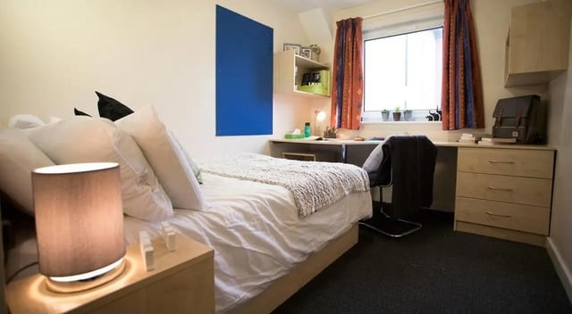 Bed desk chair and dresser student bedroom at College Court in Stoke-On-Trent Student Accommodation