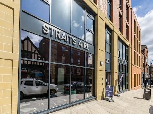 Modern building entrance with Straits Aire signage exterior at Straits Aire in Leeds Student Accommodation