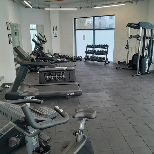 Treadmills exercise bikes dumbbells cable machine Gym at Saltwater Place in Plymouth Student Accommodation
