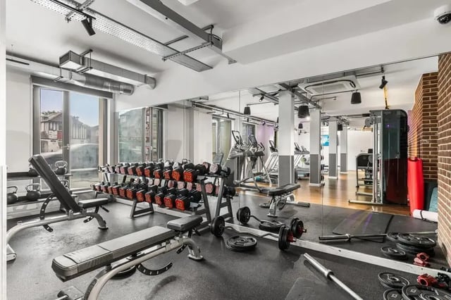 Dumbbells treadmills weight benches gym. at Chapter White City in London Student Accommodation