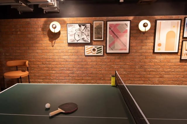 Ping pong table paddle ball and chair playing area at Centre Court in Nottingham Student Accommodation