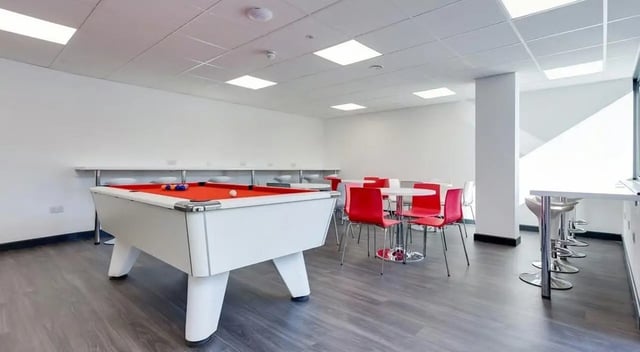 Pool table tables chairs bar stools common room at Marland House in Southampton Student Accommodation