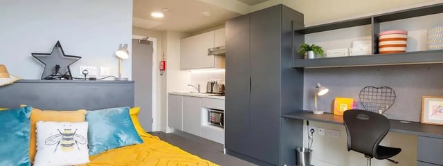 Bed study area with kitchenette and storage study area at Element Manchester in Manchester Student Accommodation